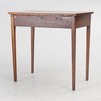 A table, England, circa 1900.