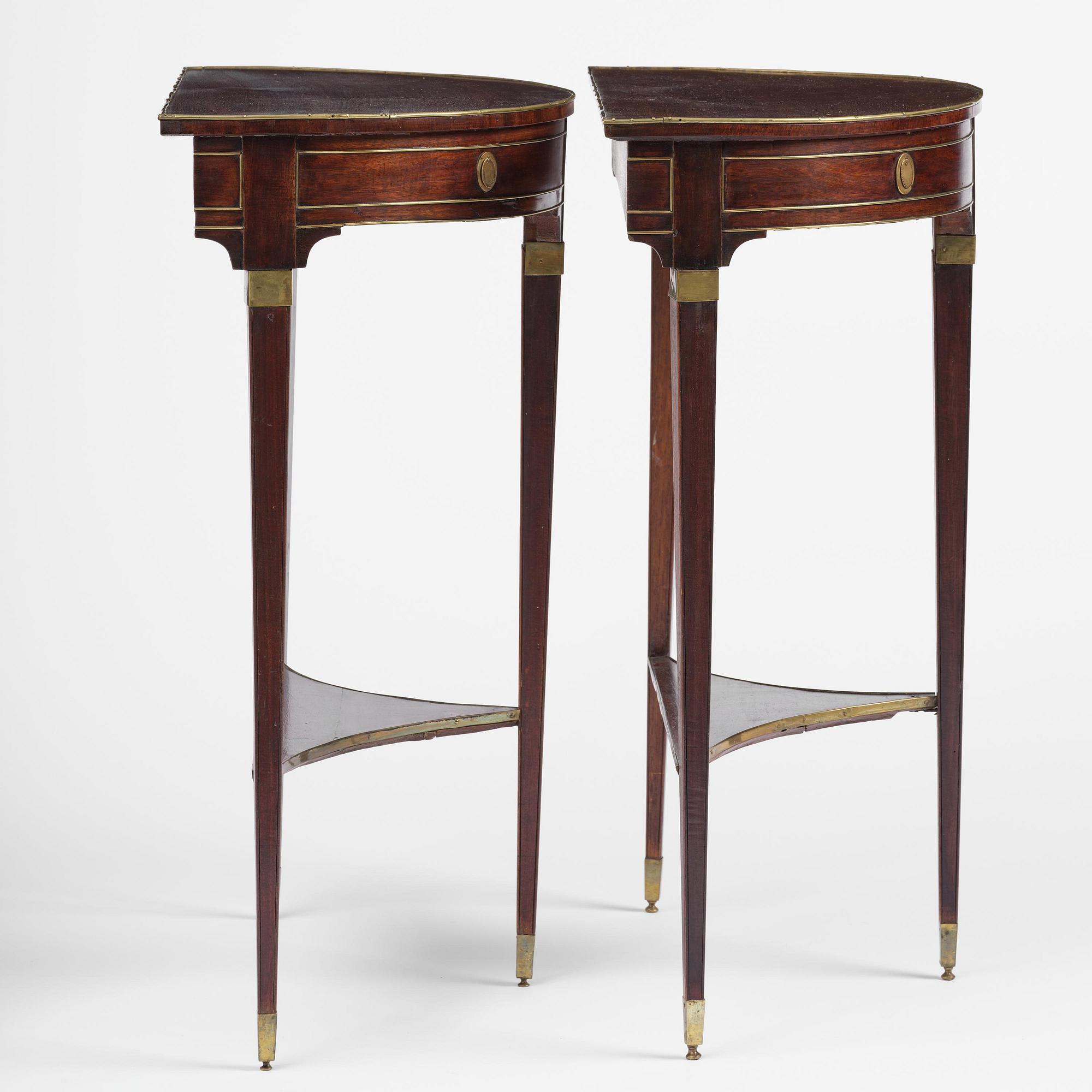 A pair of late Gustavian mahogany consoles in the manner of A. Lundelius, Stochkolm, late 18th century.
