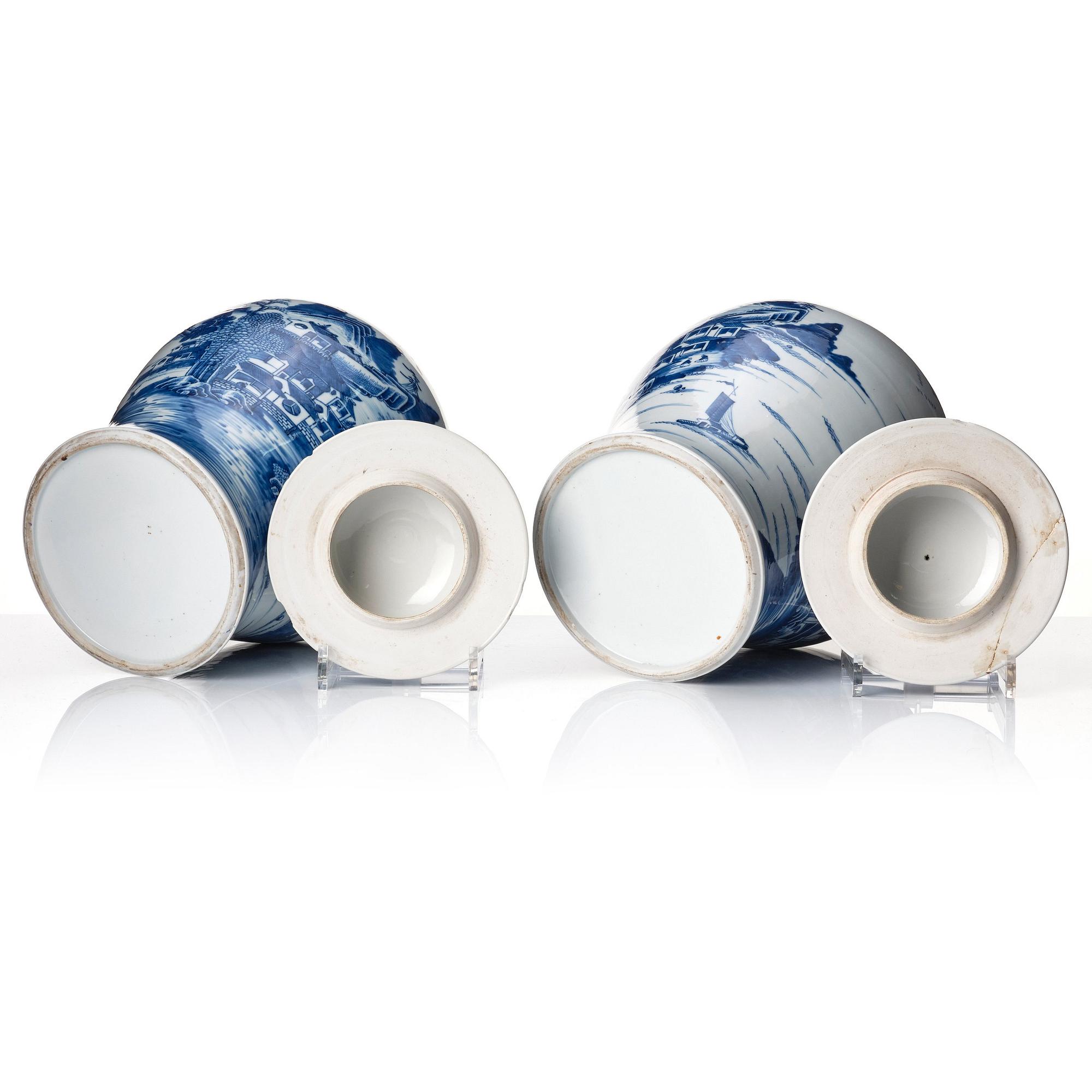 A pair of blue and white Chinese porcelain jars with covers. Qing dynasty, Qianlong (1736-95).