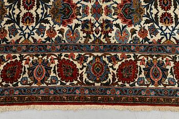 A carpet, semi-antique, ca 314,5 x 218 cm.