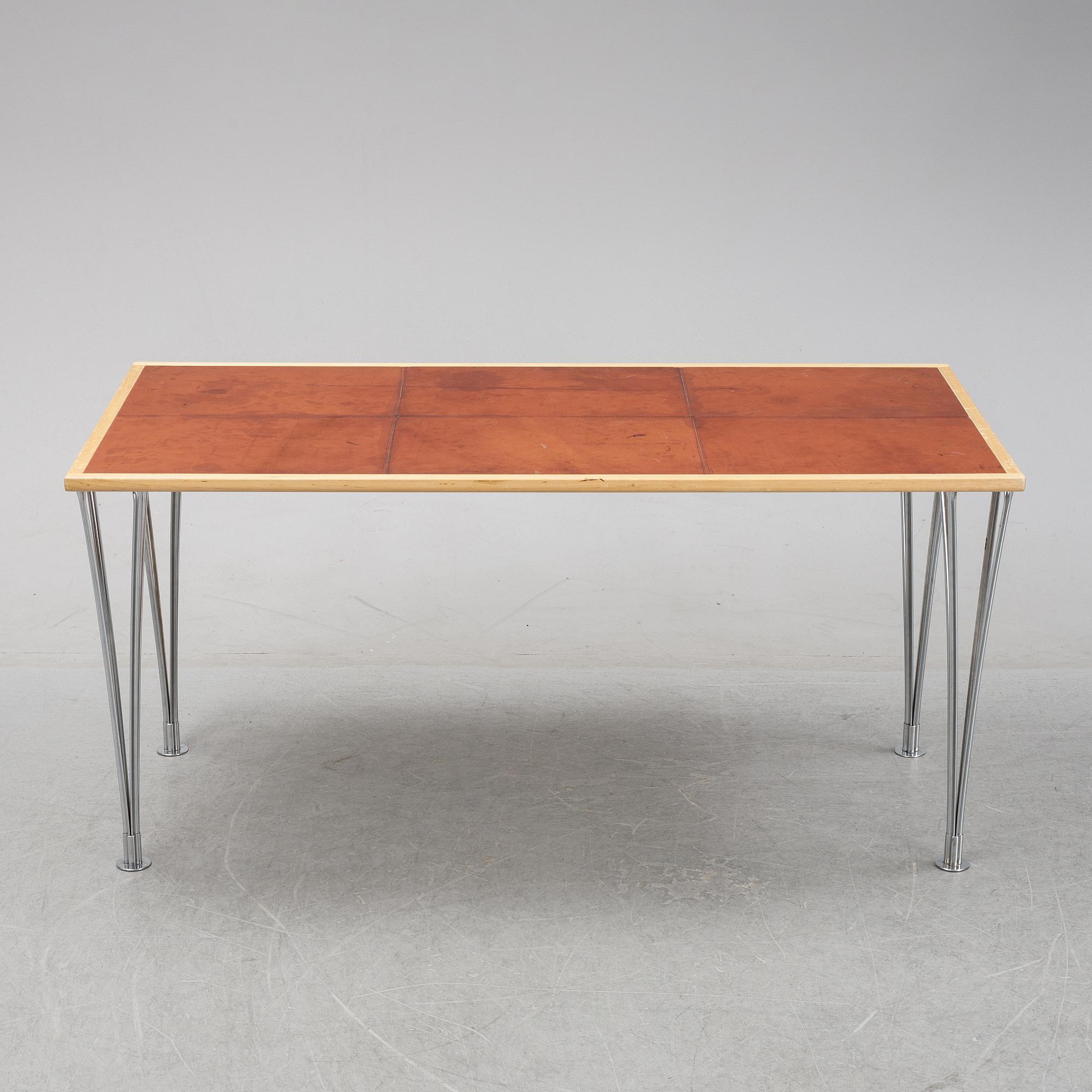 A birch and leather dining table produced by Mathsson International, 21th century.