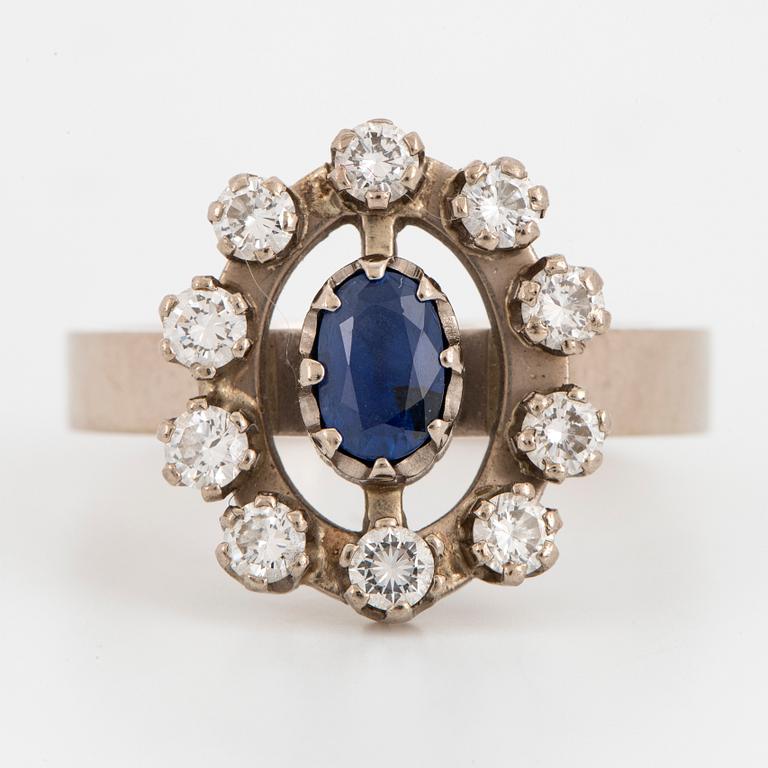 Oval faceted sapphire and brilliant-cut diamond ring.