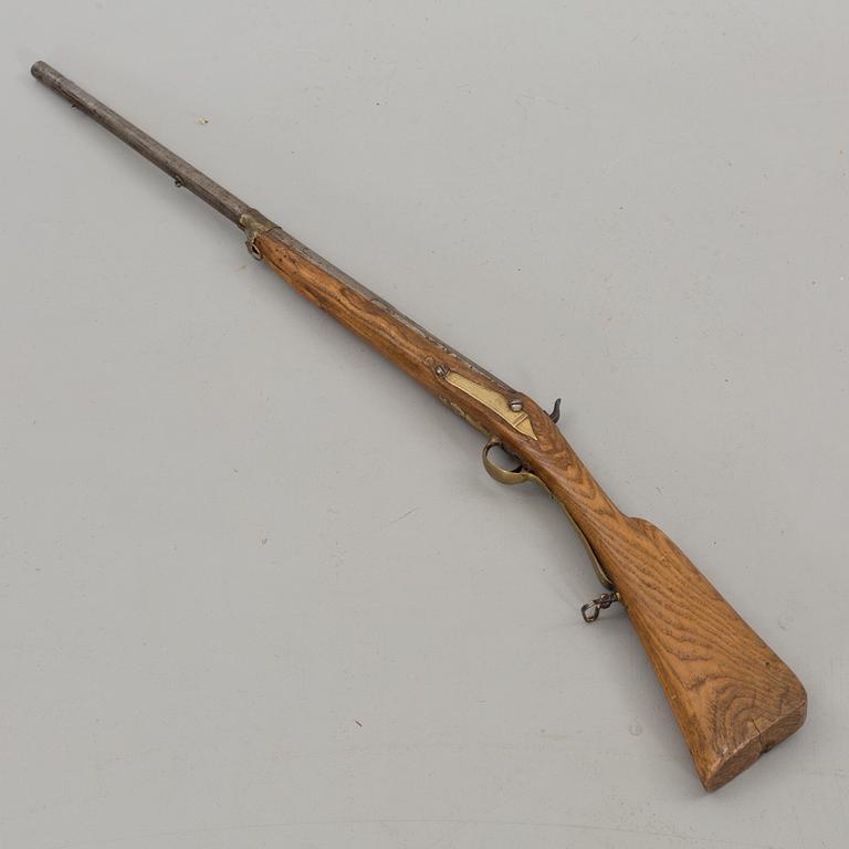 A PERCUSSION LOCK RIFLE, signed Ekwall Norrköping.