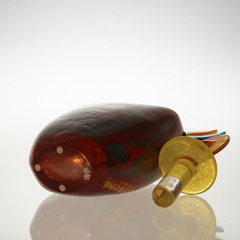 A Kjell Engman cast glass bottle with stopper, Kosta Boda 1991.
