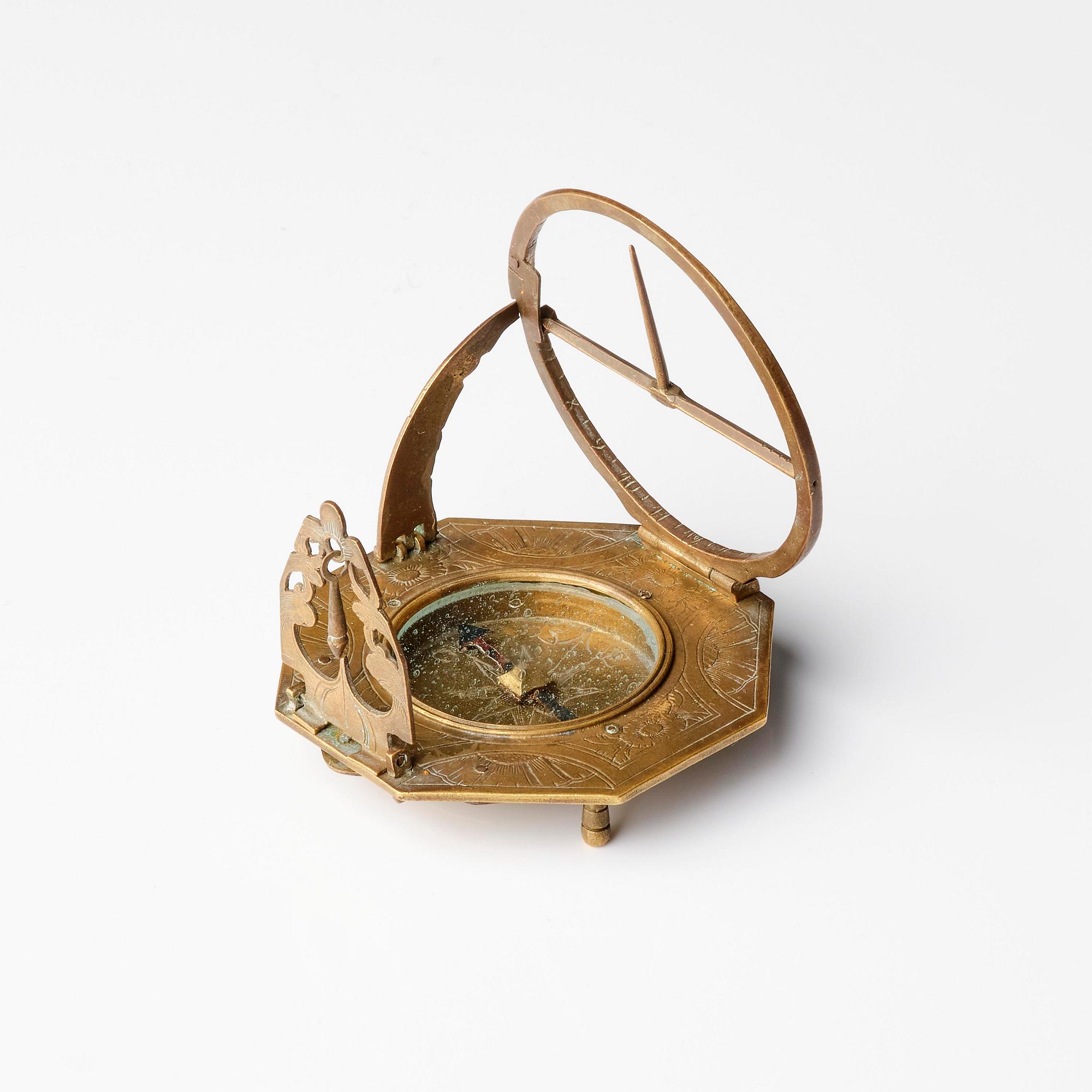 An engraved brass octagonal equinoctial compass sundial by Andreas Vogler (Augsburg, c. 1766-90).