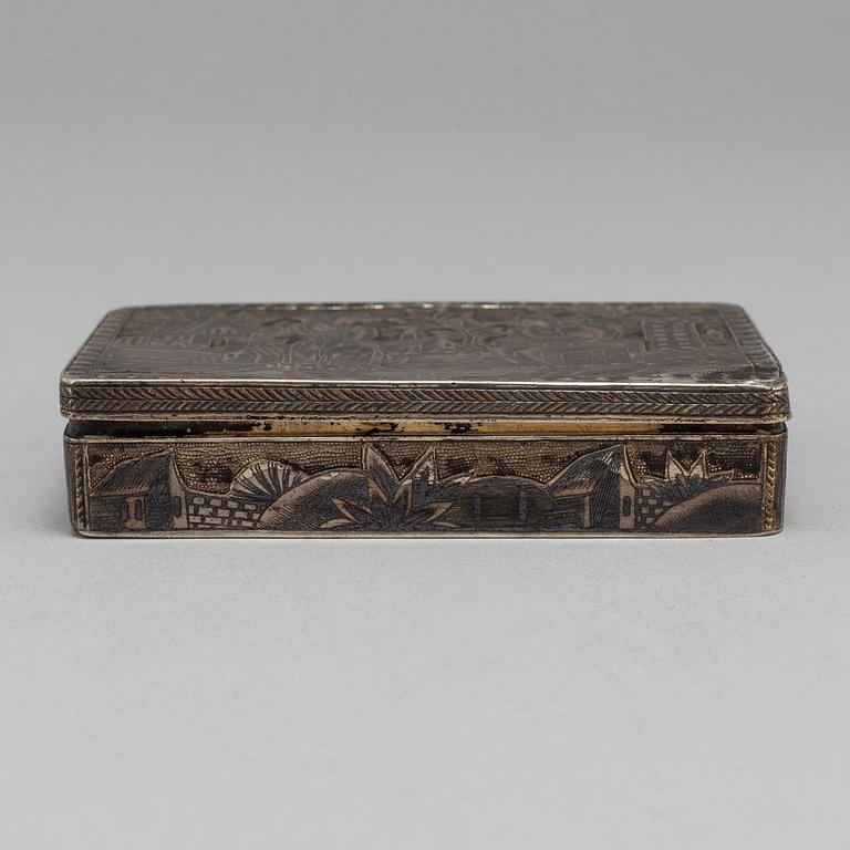 A Russian mid 19th century silver-gilt and niello snuff-box, mark of Moscow.