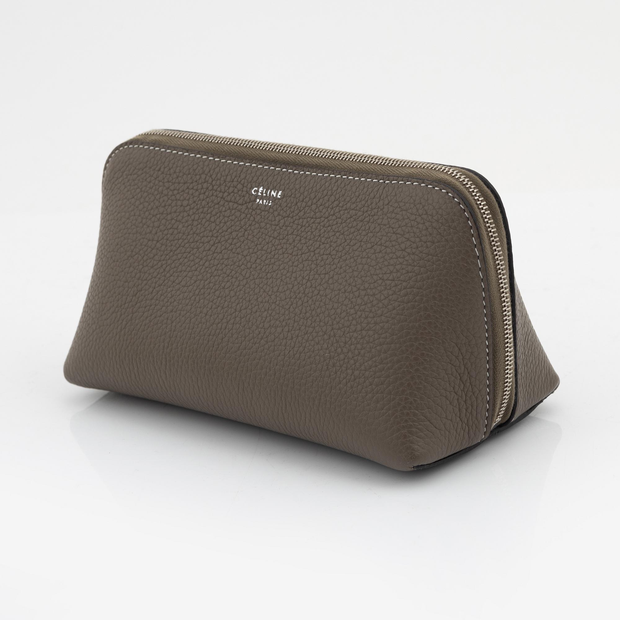 Céline, A small cosmetic pouch in beige leather.