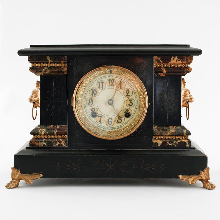 A 19th century table clock by New Haven Clock Co in New Haven, USA.