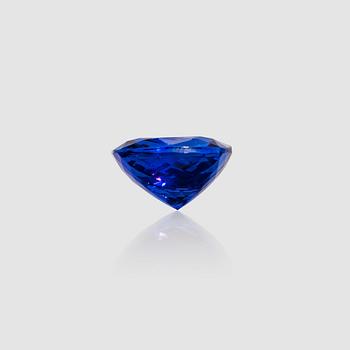 1286. An unmounted cushion-cut tanzanite, 22.94 cts. EGL certificate.