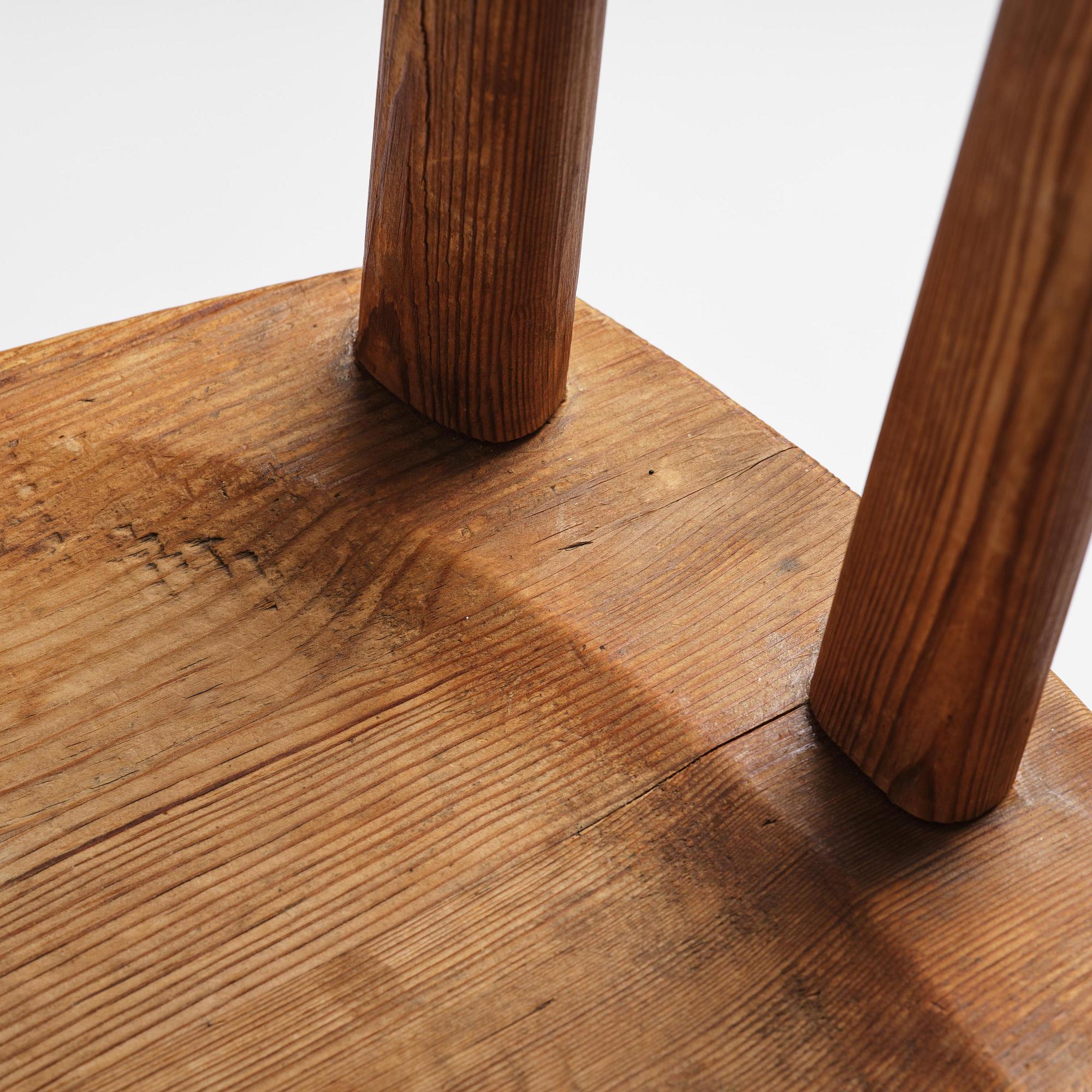 Axel Einar Hjorth, a set of seven stained pine "Utö" chairs, Nordiska Kompaniet, Sweden, 1930s.