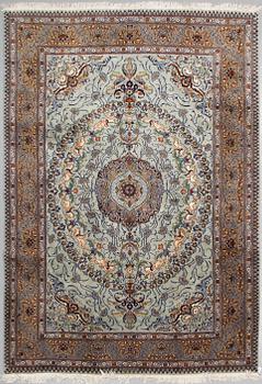 A CARPET, Kashmar, part silk, signed Mosafar Khan, around 344 X 241.