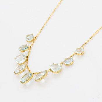 Collier, med runda fasettslipade akvamariner.