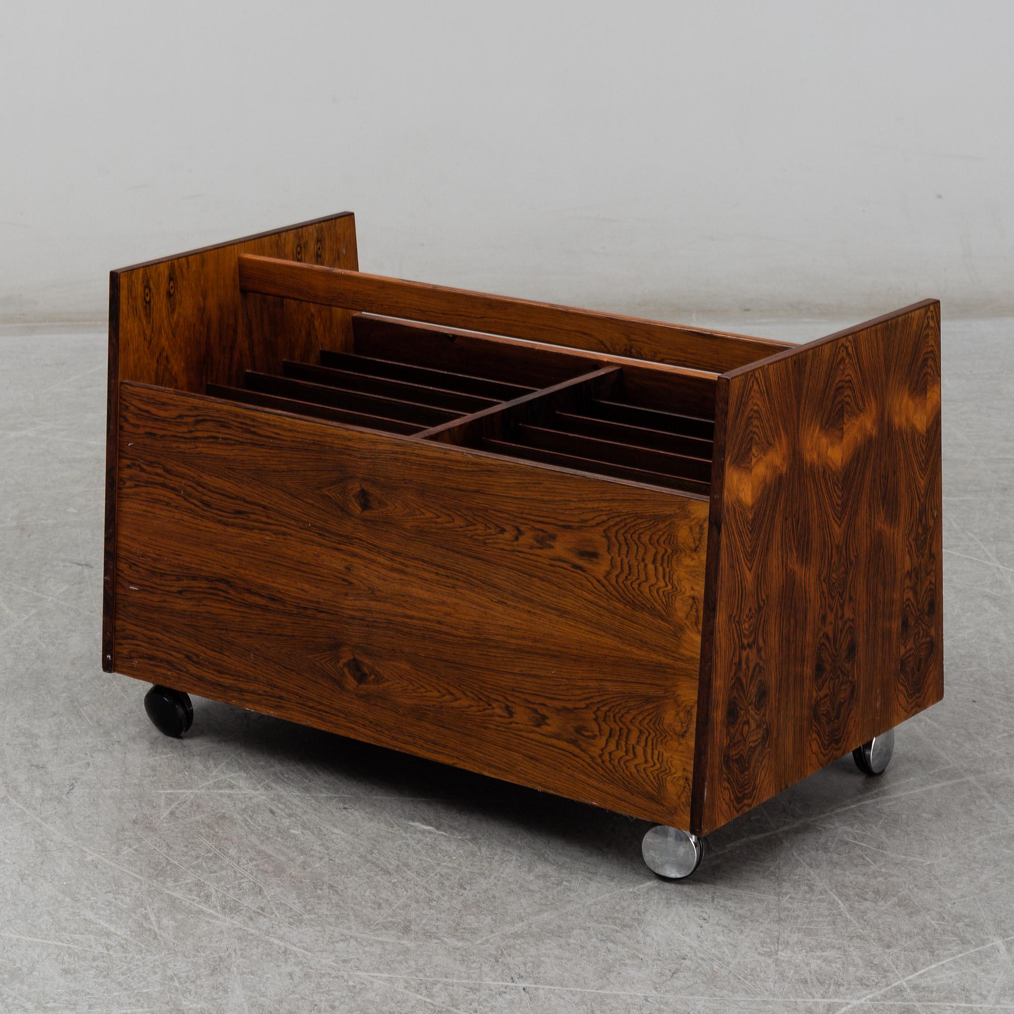 ROLF HESLAND, a rosewood veneered newspaper/LP stand from Bruksbo, Norway.