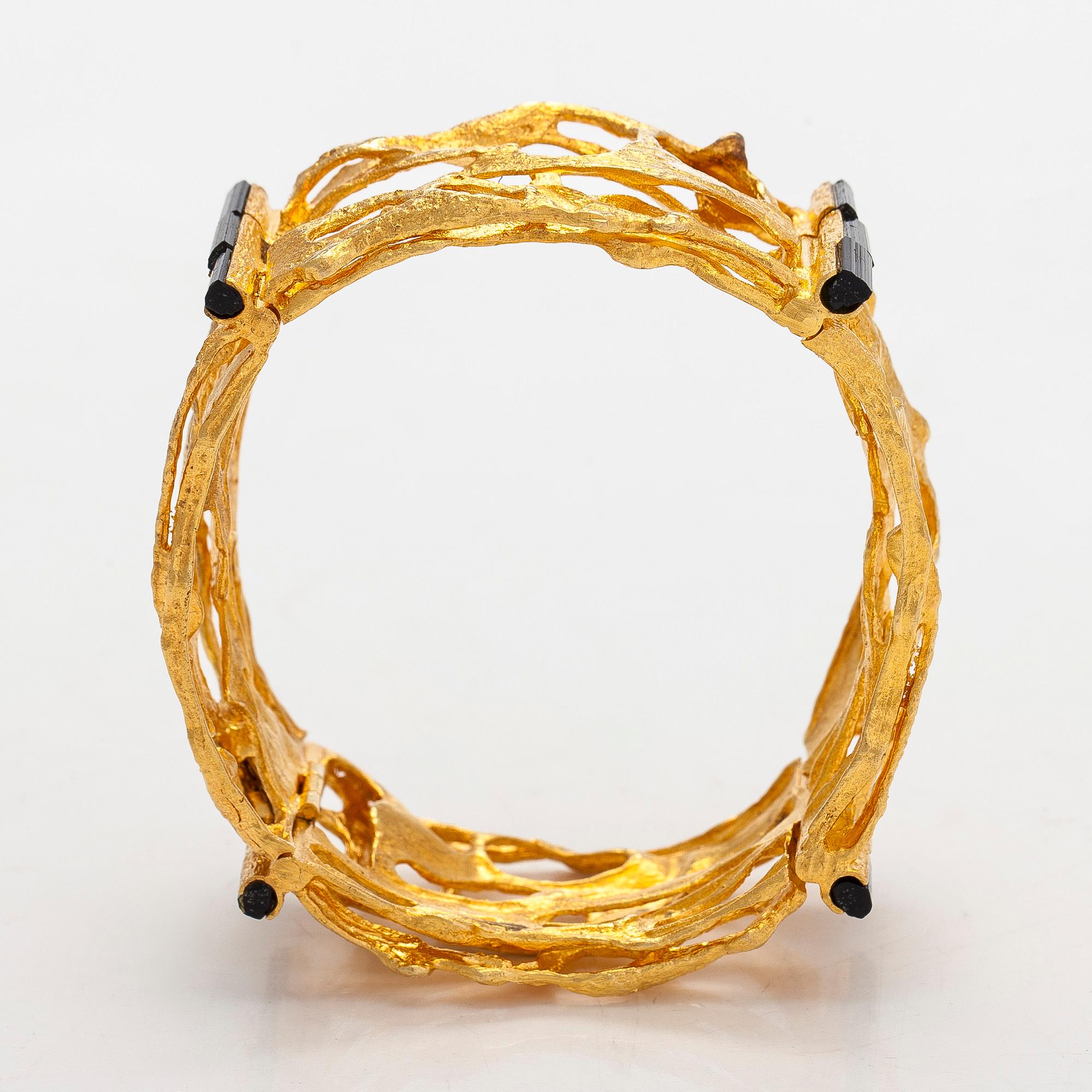 Björn Weckström, an 18K gold and tourmaline 'Sacrificial fire' bracelet. Lapponia 1971.