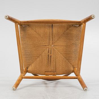 Hans J Wegner, a model 'CH 24' beech chair, Carl Hansen & Son, Odense, Denmark.