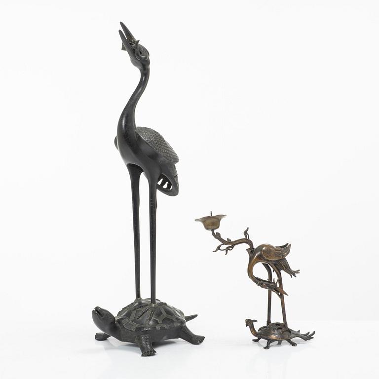 Two bronze sculptures/candle holders, Japan & China, 20th century.