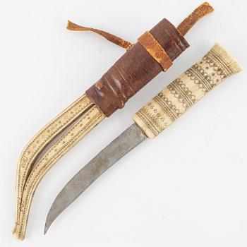 Jon Pålsson Fankki, a reindeer horn knife, signed and dated 1902.