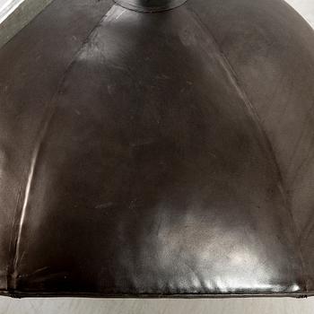 An Arne Jacobsen, aluminium and leather armchair, "Ägget" for Fritz Hansen designed in 1958.