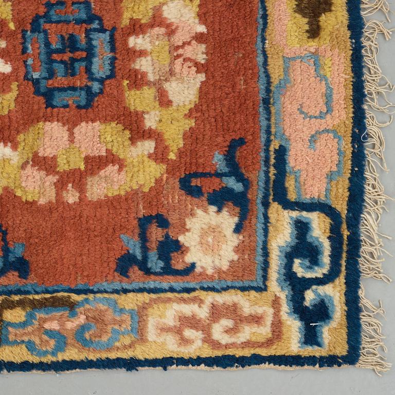 A MEDITATION RUG, three squares, an antique Ningxia, China, the Qing dynasty, ca 166 x 58,5 cm.