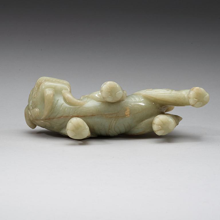 A green nephrite mytological lion, 20th century.