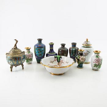 A collection of vases and bowls as well as incense burners cloisonné works China 20th century.
