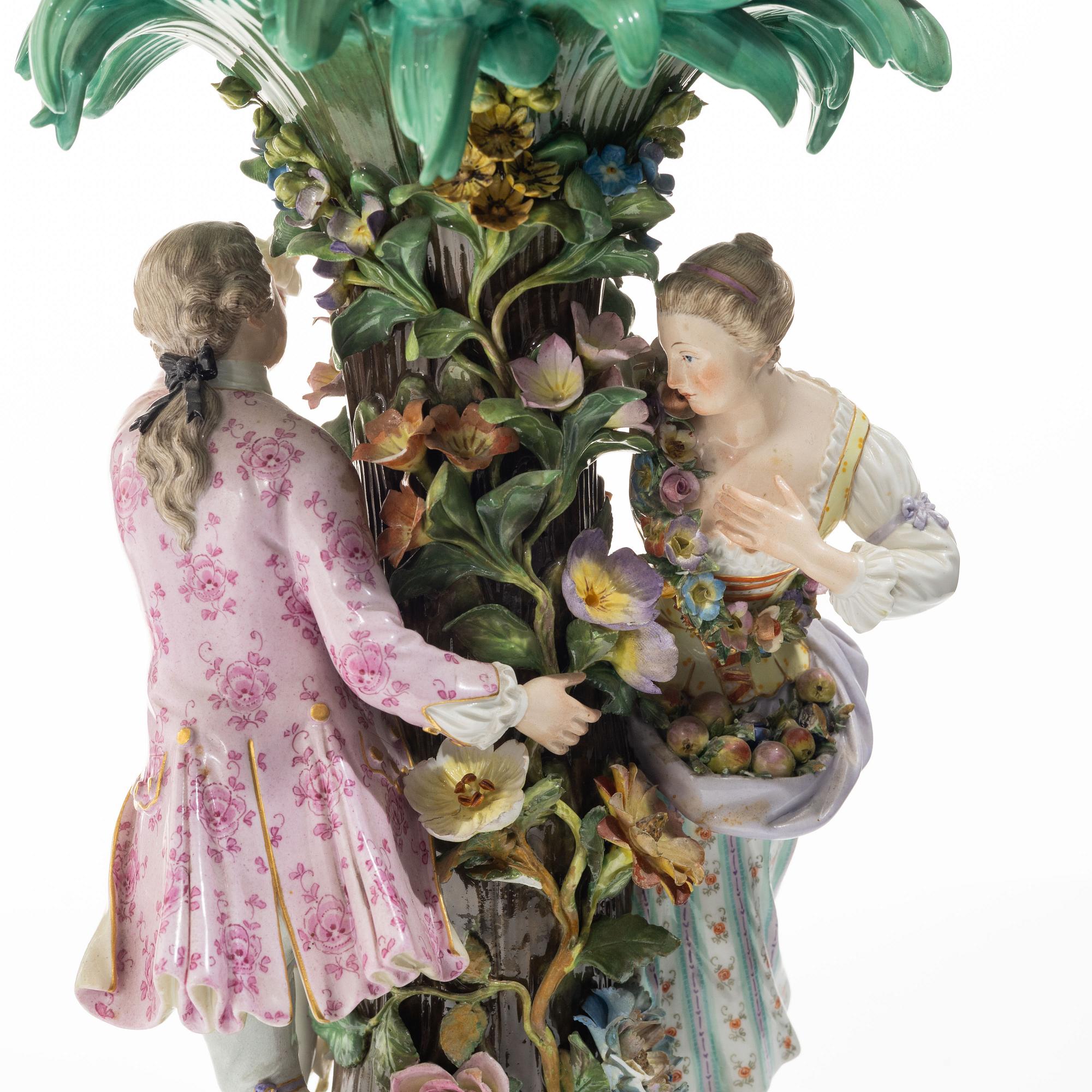 Meissen, A large polychrome reticulated porcelain basket on a pedestal with dancing figures, 19th century.