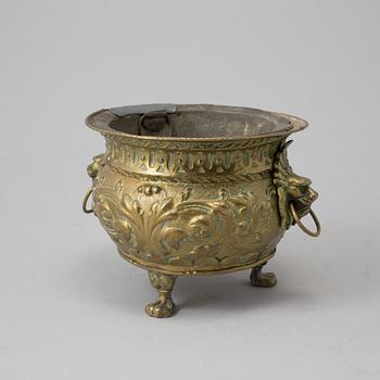 A 19TH CENTURY BRASS FLOWER POT.
