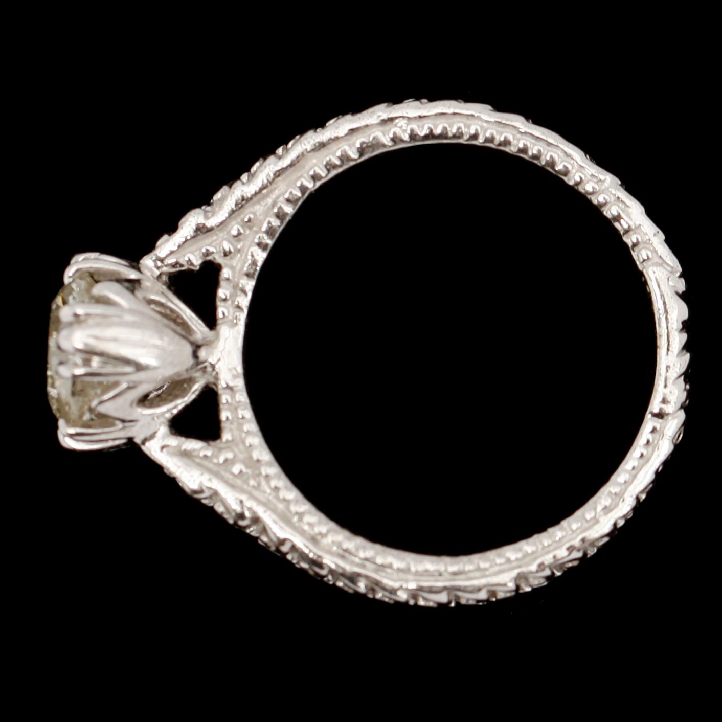 RING, 14 k vitguld med solitär briljant 1.30 ct.