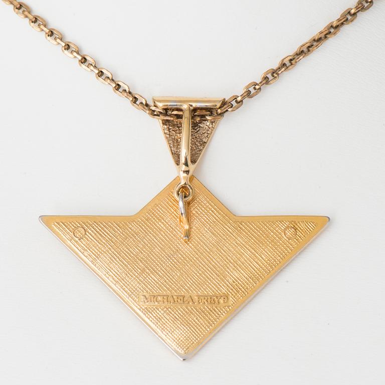 A NECKLACE and A PAIR OF EARRINGS, costume jewelry, Michaela Frey.