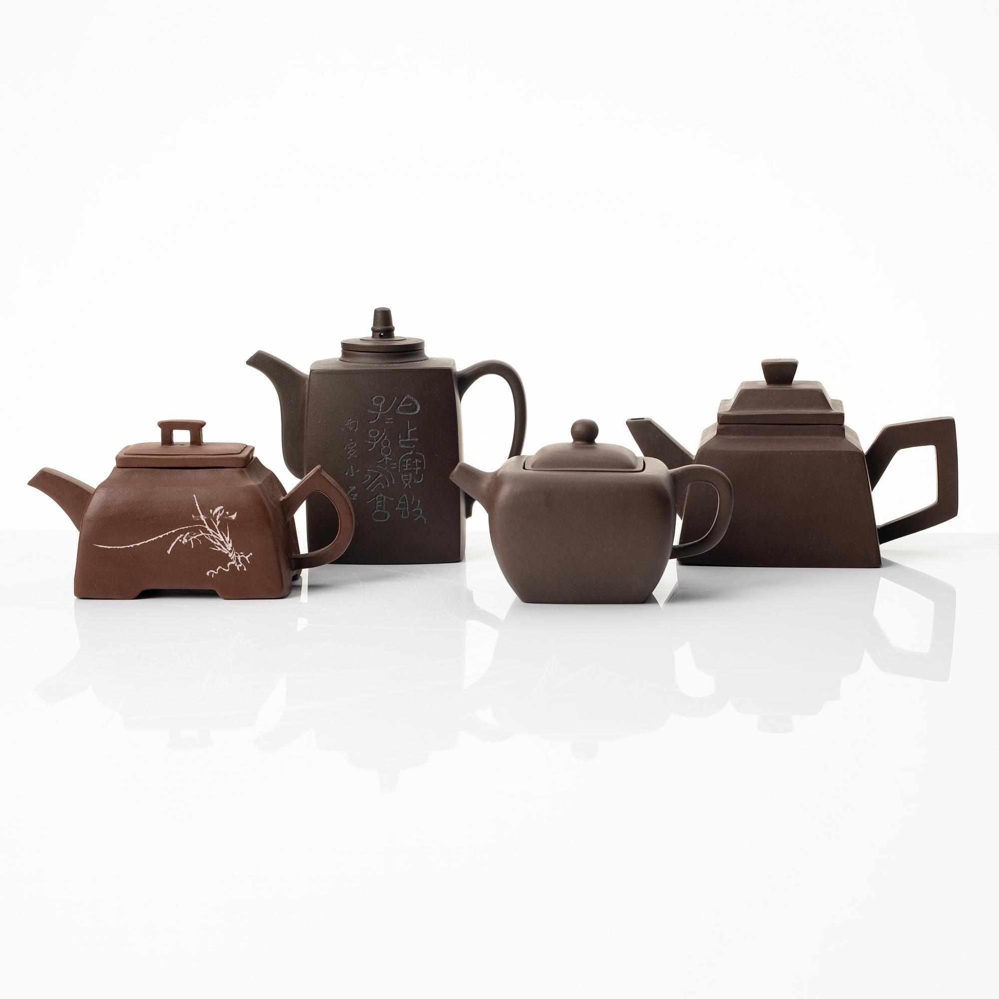 A group of four square yixing teapots, China, 1970/80s.