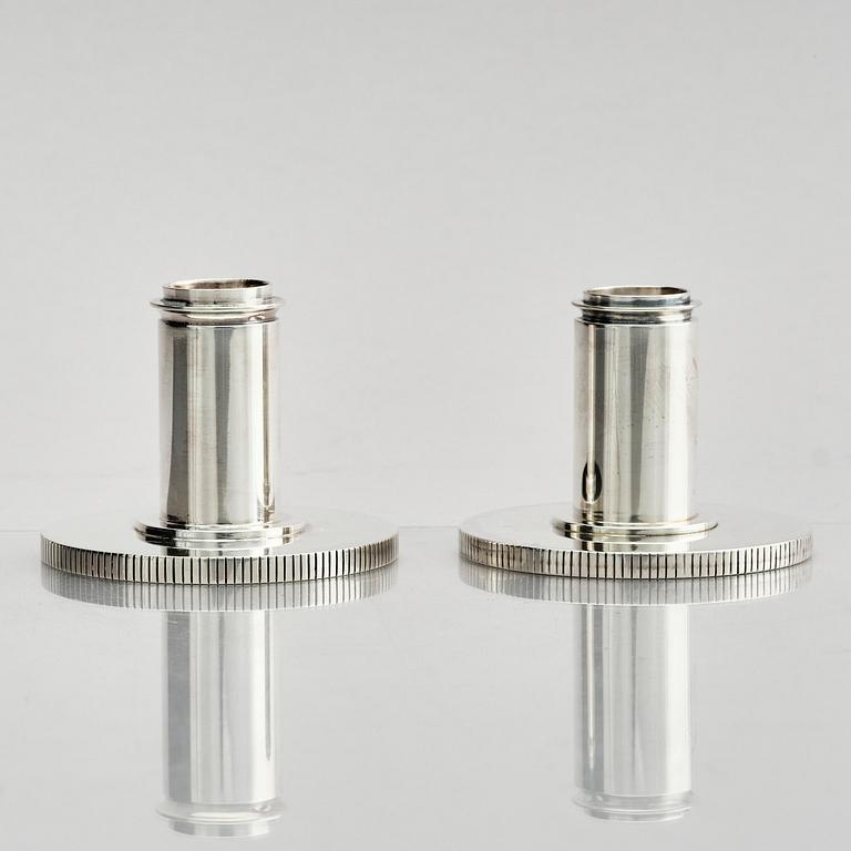 Georg Jensen, a pair of sterling silver candlesticks, design by Sigvard Bernadotte, model no 711A, Copenhagen, Denmark after 1945.