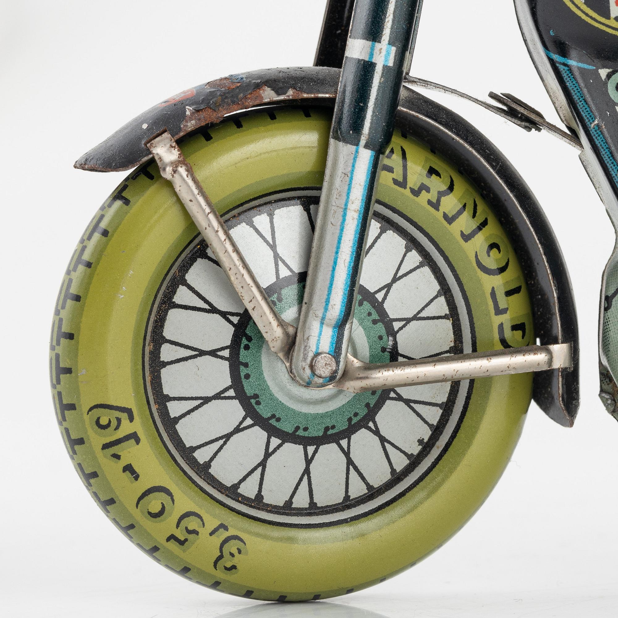 A tin motorcycle, 'Mac 700' from Arnold, Germany, around mid 20th Century.