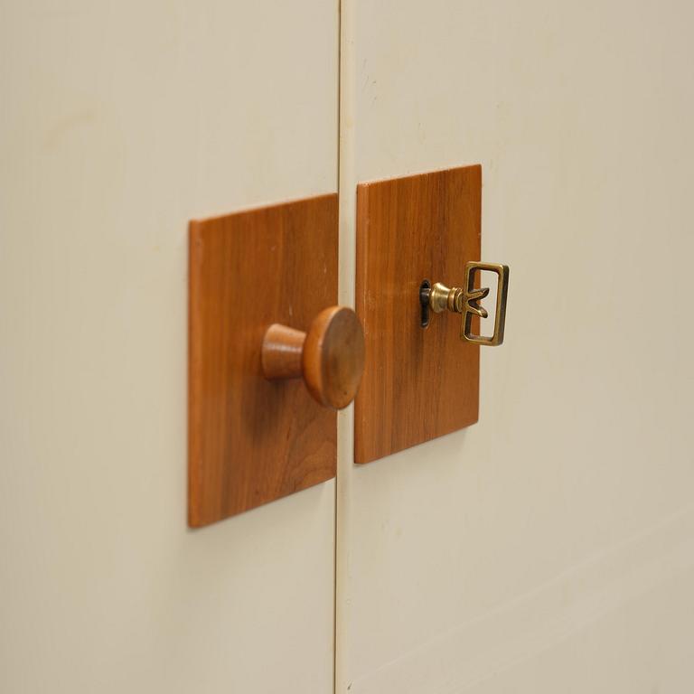 Josef Frank, a set of three bookcases model "B 2255", Firma Svenskt Tenn, mid-20th century, provenance Estrid Ericson.