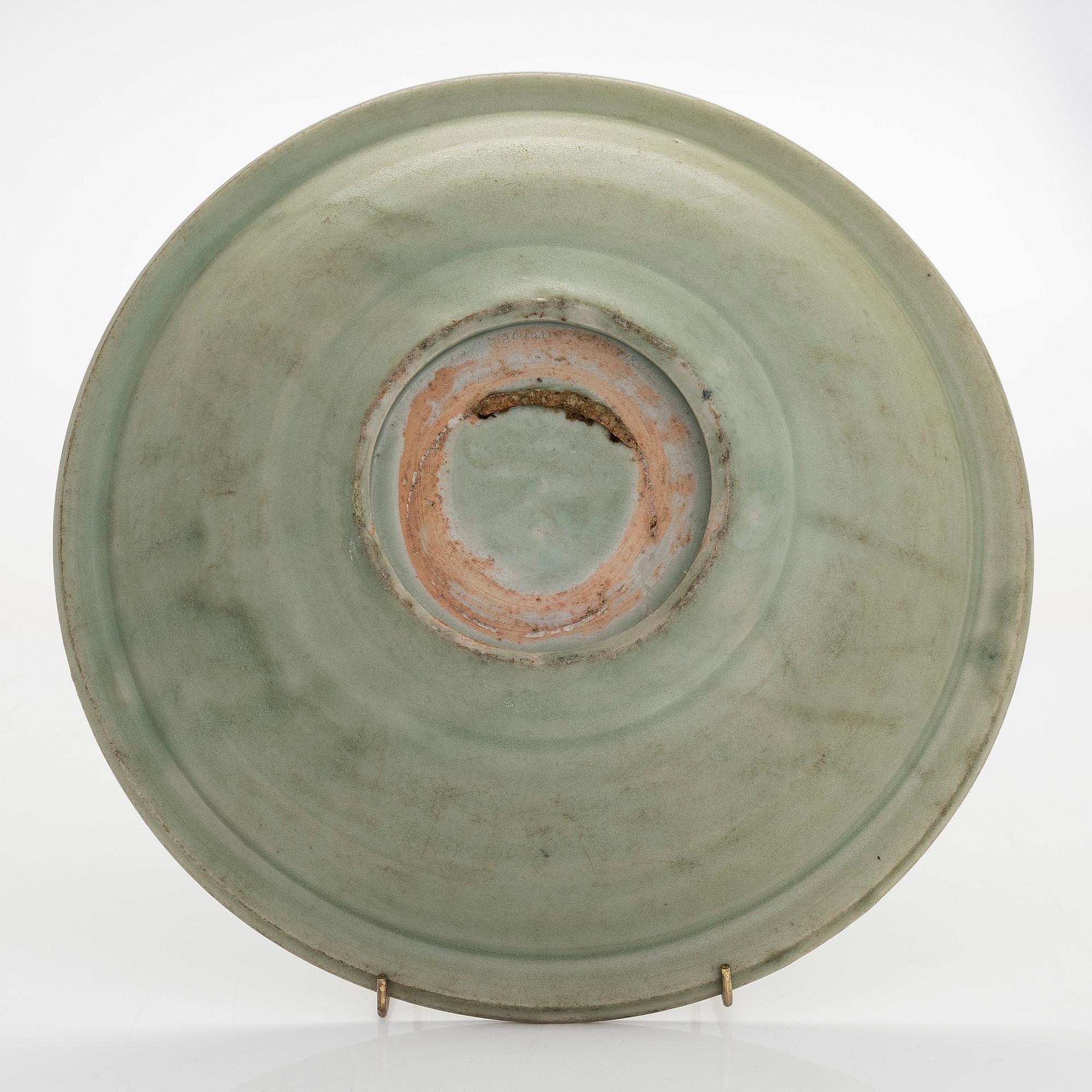 A Celadon dish, Ming dynasty (1368-1644).