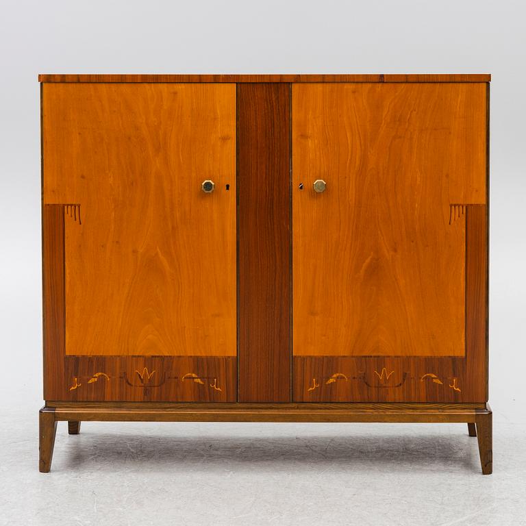 A Swedish Modern cabinet, mid20th century.