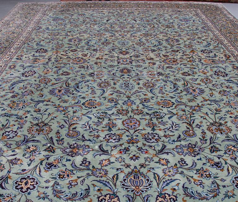 A carpet, an old Kashan, ca 554,5 x 351,5-358 cm, an inscription: Kashan Tavasoli.