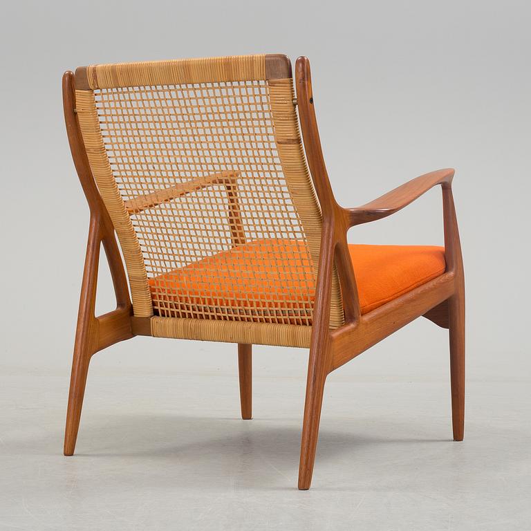 S A ANDERSEN, ERIK ANDERSEN & PALLE PEDERSEN, a teak and rattan easy chair from Horsnaes, Horsens, Denmark, 1960's.