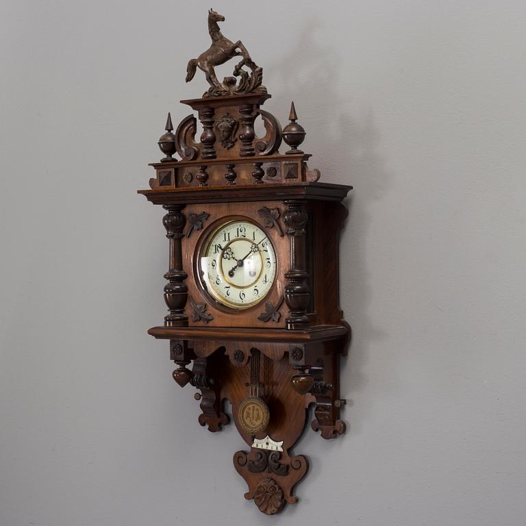 A circa 1900 Renaissance style wall clock.