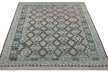 A Kilim rug, c. 250 x 194 cm.