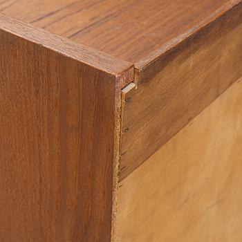 A teak writing desk, 1950-60s.