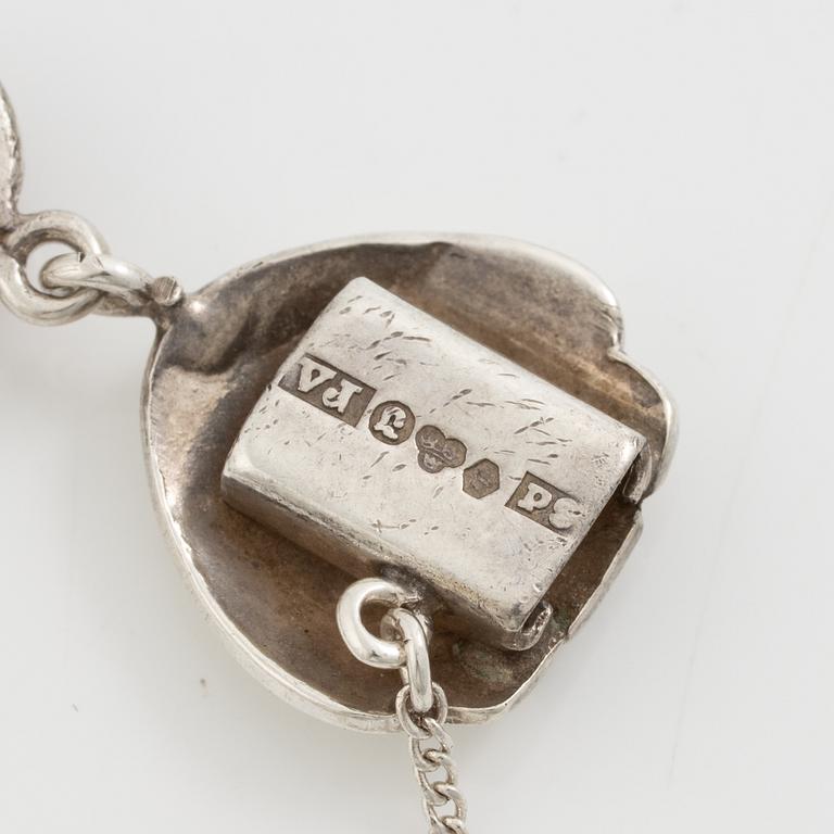 Victor Janson, two silver bracelets, one set with tiger's eye.