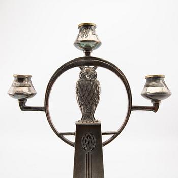 Candelabras, a pair by WMF (Württembergische Metallwarenfabrik), early 20th century, nickel silver.