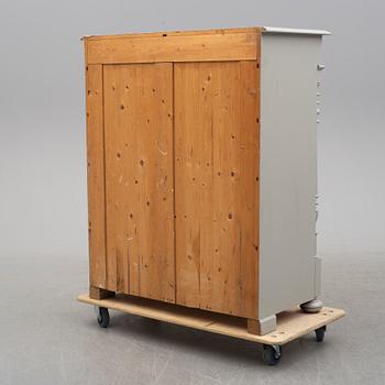 a cabinet from around 1900.