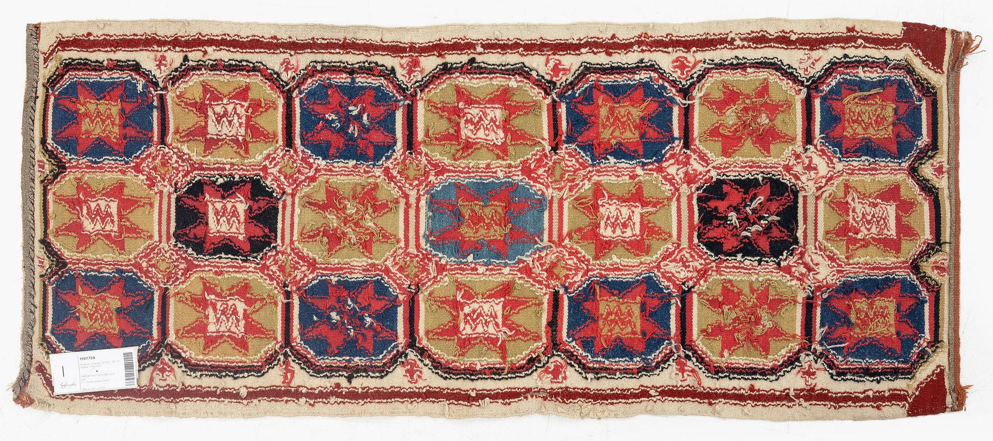 A carrige cushion, flat weave, c. 100 x 43 cm, Scania, 1790-1810.