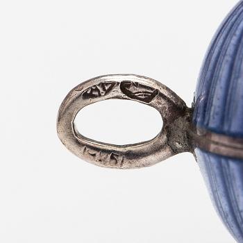 A Tillander, A silver necklace with an enameled egg.