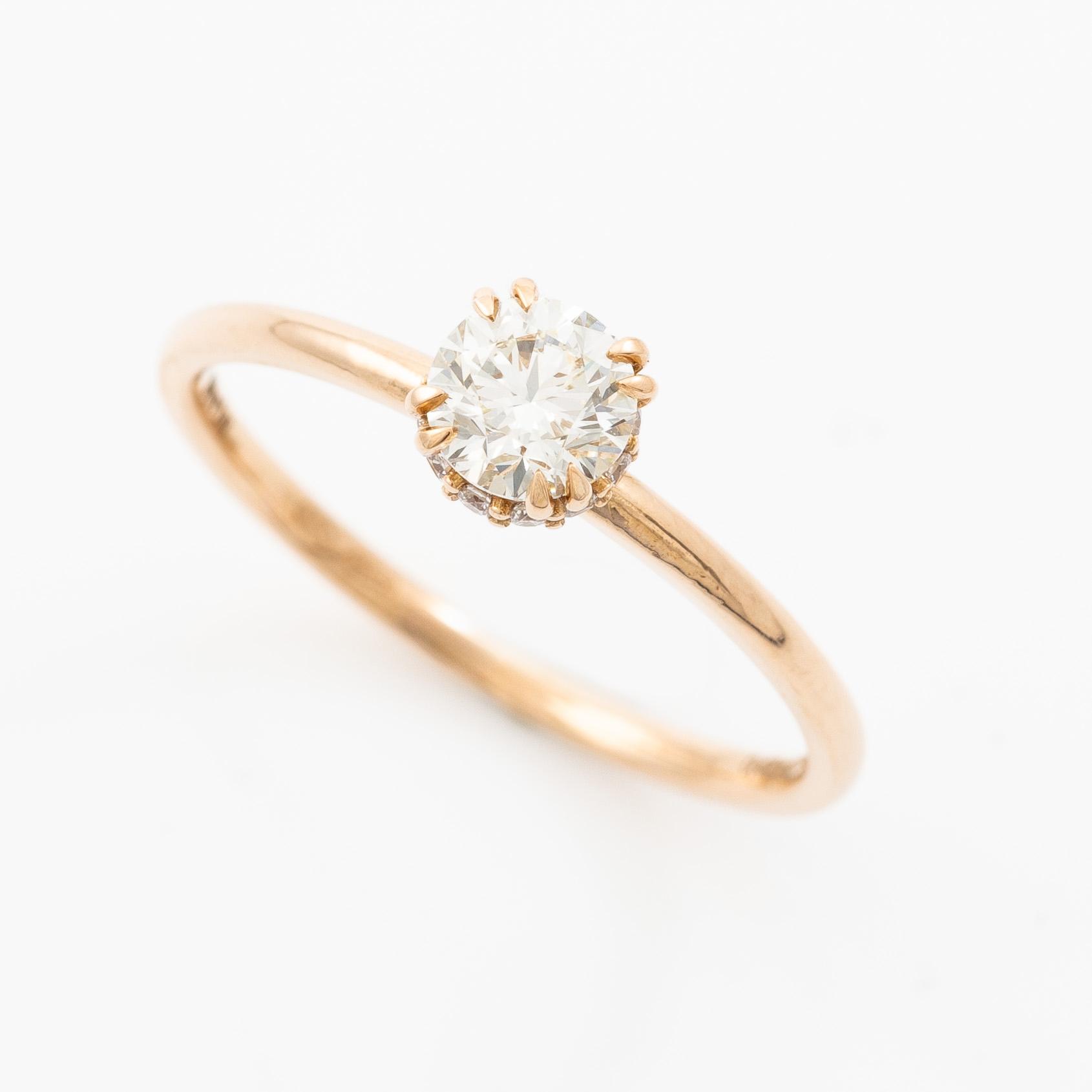 Ring 14K guld med briljantslipade diamanter.