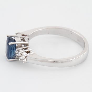 A sapphire and brilliant cut diamond ring.