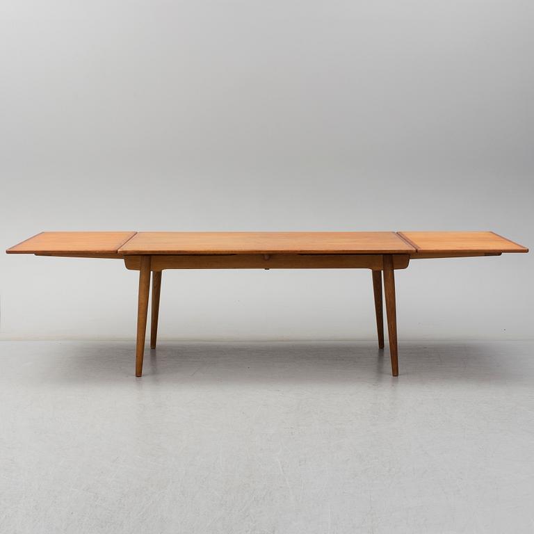 HANS J WEGNER, a model 'AT312' teak and oak dining table from Andreas Tuck, Denmark.