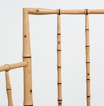 A pair of late Gustavian bamboo imitation armchairs by Ephraim Ståhl, master in Stockholm 1794-1820.