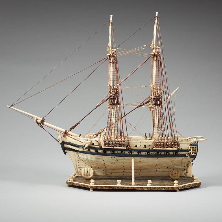 An Anglo-French early 19th century carved bone "Prisoner of War" 40 gun ship model.